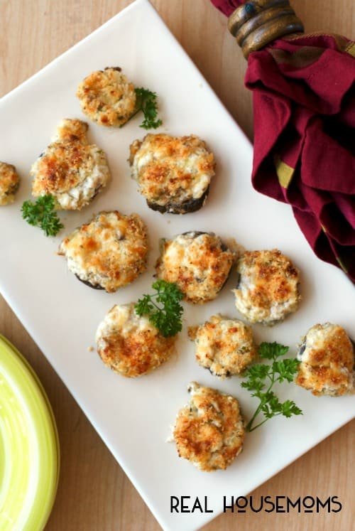 THREE CHEESE STUFFED MUSHROOMS are a party perfect appetizer made by stuffing mushrooms to the brim with three kinds of cheese and topping them with buttery panko breadcrumbs!