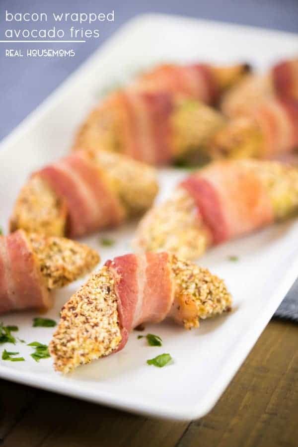 BACON WRAPPED AVOCADO FRIES have to be at your Super Bowl party! It's an easy appetizer and perfect for entertaining!