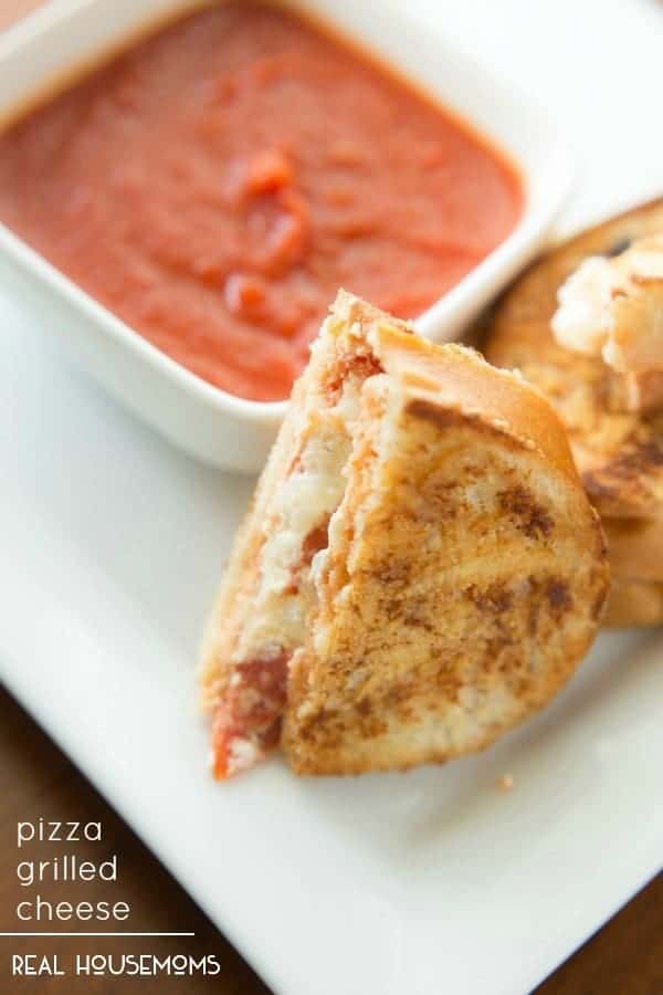 These PIZZA GRILLED CHEESE bites are the perfect lip-smacking finger foods adults and kids alike will love!
