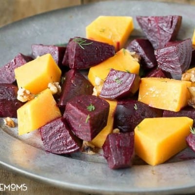 ROASTED HONEY GINGER BEETS AND WINTER SQUASH are simple roasted vegetables with a to die for dressing! Everything in this dish is good for you and there's no skimping on flavor!
