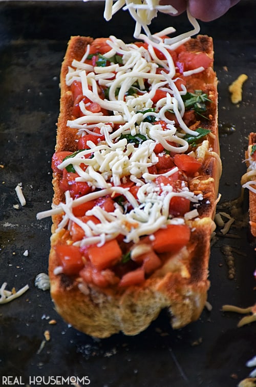 CAPRESE BRUSCHETTA is an easy recipe loaded with flavor! We love making some for an easy appetizer or to enjoy for pizza night during the week!