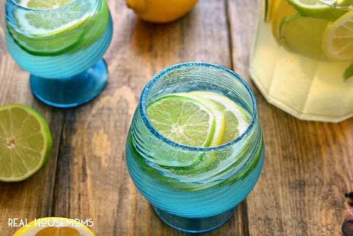 This LEMON-LIME SANGRIA is deliciously refreshing and packed full of bright citrus flavors! The perfect drink for citrus season!