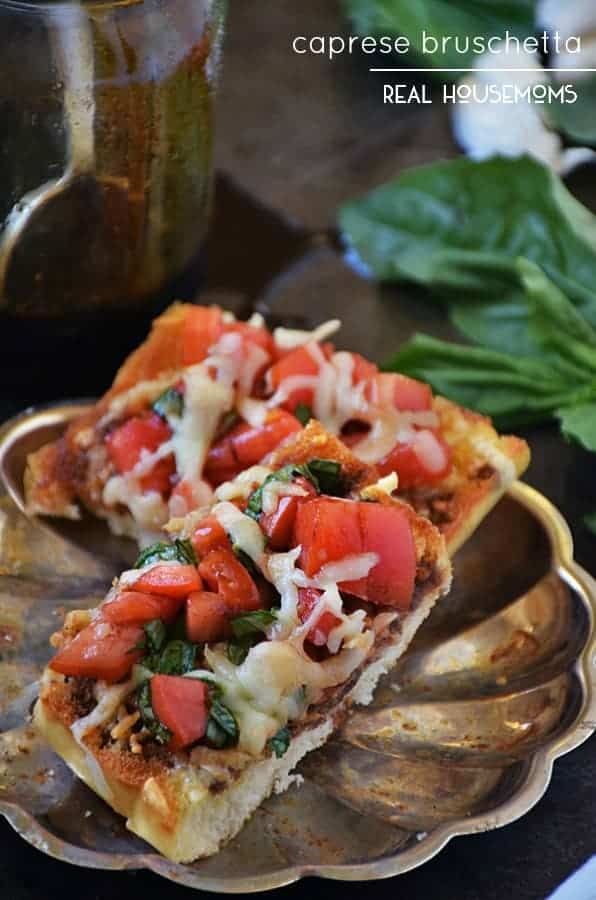 CAPRESE BRUSCHETTA is an easy recipe loaded with flavor! We love making some for an easy appetizer or to enjoy for pizza night during the week!
