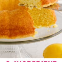 slice of weight watchers lemon cake on a spatula over the cake with recipe name at the bottom