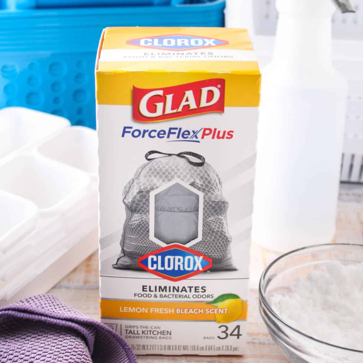 square image of Glad® ForceFlexPlus with Clorox™ trash bags next to cleaning and organization items