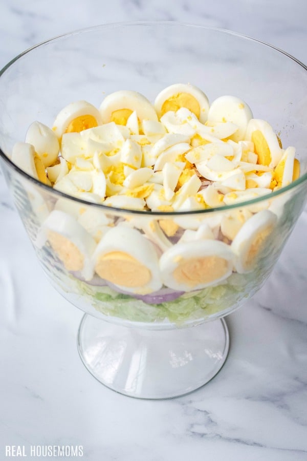 hard boiled eggs layer and presentation tip for 7 layer salad