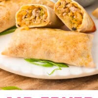 air fryer egg roll cut in half to show filling with recipe name at the bottom