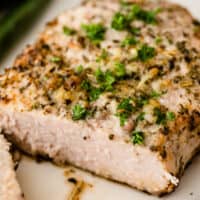 square close up of an air fryer pork chop cut in half