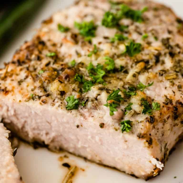 square close up of an air fryer pork chop cut in half