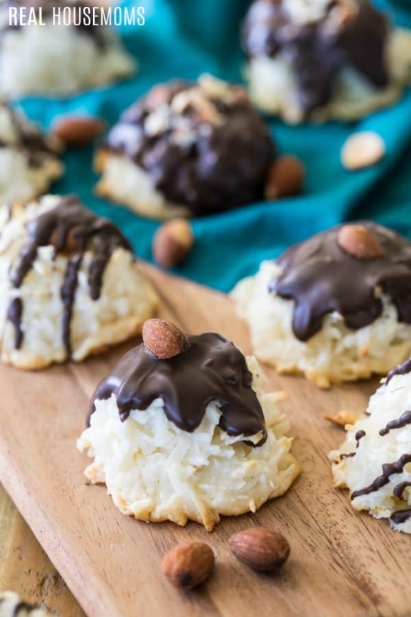 coconut macaroons covered in chocolate with almonds to make almond joy cookies