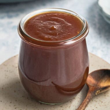 square image of a jar of apple butter