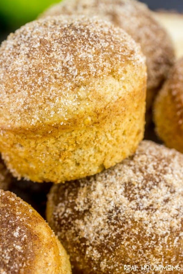 Close up os Apple Cider Muffins dusted in cinnamon sugar