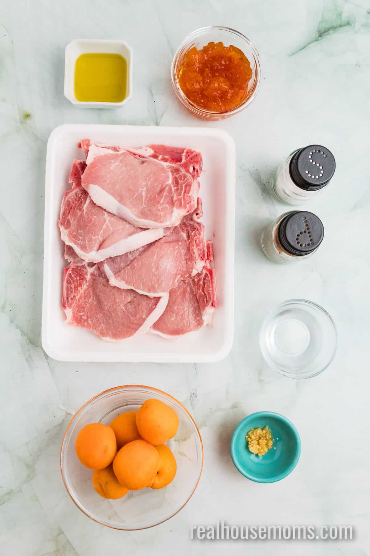 ingredients to make apricot grilled pork chops laid out on a counter