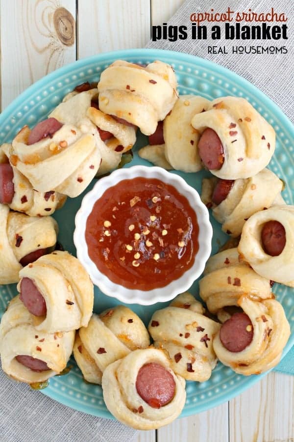 A childhood favorite gets a sweet & spicy makeover perfect for the adults in these Apricot Sriracha Pigs in a Blanket!
