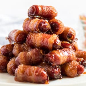 Bacon Wrapped Smokies are a classic holiday party and football game appetizer! You'll go crazy for the delicious brown sugar glaze!