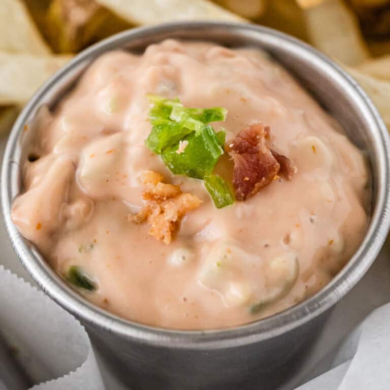 square image of bacon jalapeno fry sauce in a metal ramekin
