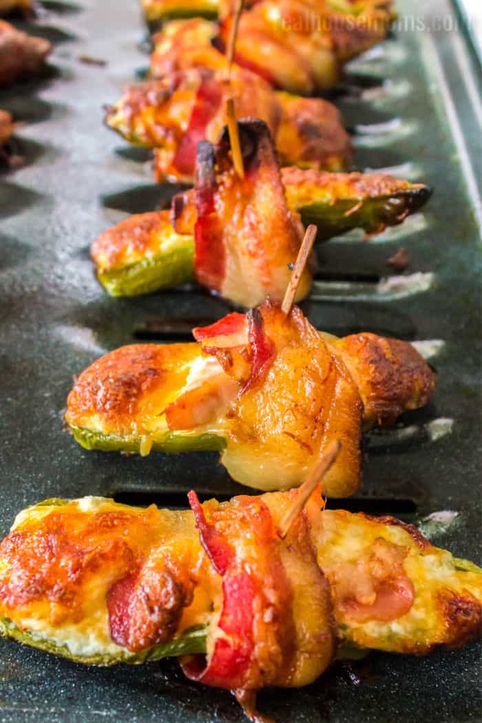 bacon wrapped chicken jalapeno poppers after cooking