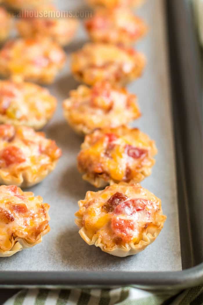 close up of bacon rotel phyllo cups on a baking sheet
