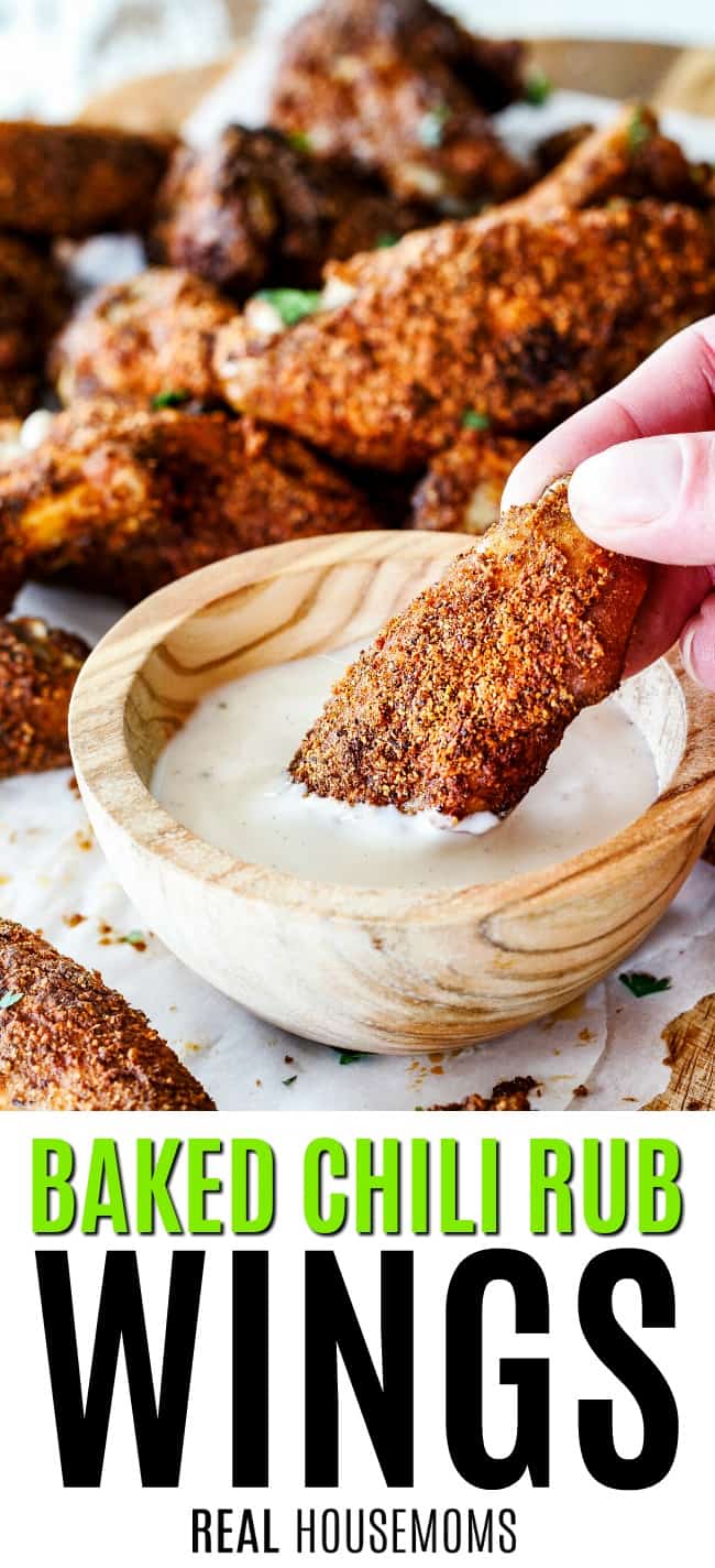 baked chili rub wing being dipped into ranch dressing