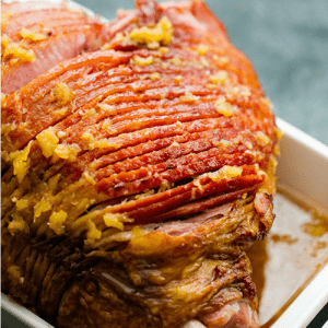 Tender and juicy Pineapple Glazed Baked Ham has the perfect blend of sweet and savory flavors. An easy recipe that will please your guests for the holidays!