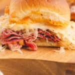 close up of baked reuben slider on a cutting board