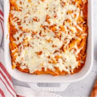 baked ziti in a casserole dish with recipe name at the bottom