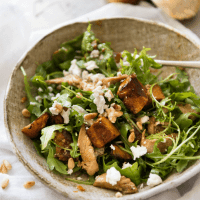 This Balsamic Pumpkin & Chicken Salad is made with sweet, golden roasted pumpkin and chicken tossed with arugula leaves and a wicked Honey Balsamic Dressing. THIS is a salad worthy of being a meal!