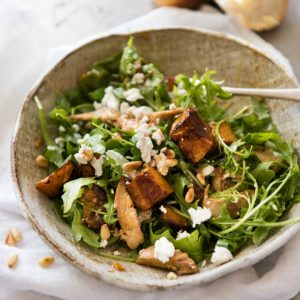 This Balsamic Pumpkin & Chicken Salad is made with sweet, golden roasted pumpkin and chicken tossed with arugula leaves and a wicked Honey Balsamic Dressing. THIS is a salad worthy of being a meal!