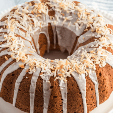 Delicious Banana Coconut Bundt Cake is a light banana cake packed with coconut & drizzled with a sweet sugar glaze. Perfect for brunch or dessert!