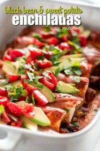 Black Bean and Sweet Potato Enchiladas are the perfect meatless meal. Full of veggies, beans & cheese, then topped with enchilada sauce, fresh tomatoes, avocados, and refreshing cilantro for a dinner you'll crave!