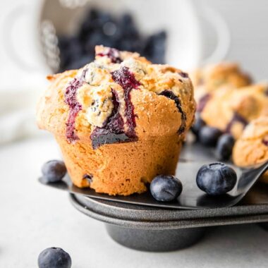 Stop searching and taste these amazing Blueberry Muffins! Bursting with fresh plump blueberries bite after bite, this recipe is a keeper!