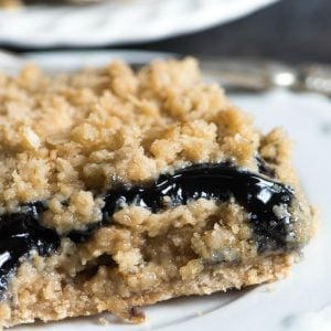 Only 6 ingredients in these Blueberry Oatmeal Bars. Use pie filling to have this recipe turn out more like a cobbler or use jam to have a packable snack!