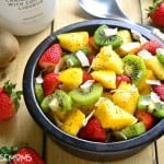This BOOZY TROPICAL FRUIT SALAD is the perfect addition to your spring or summer menu! Loaded with fresh tropical fruit and swimming in a boozy coconut-lime "dressing", it's sure to become your favorite new way to eat fruit!
