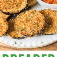 breaded eggplant piled on a plate with a bowl of marinara with recipe name at the bottom