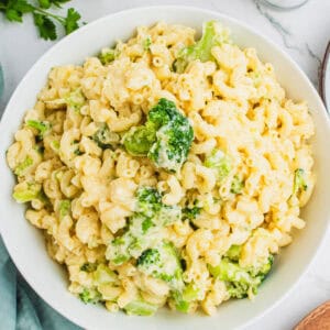 square image of broccoli mac and cheese in a serving bowl