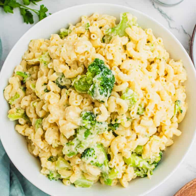 square image of broccoli mac and cheese in a serving bowl