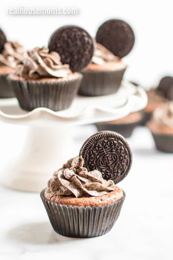 brownie cookie cupcakes with an Oreo in the frosting
