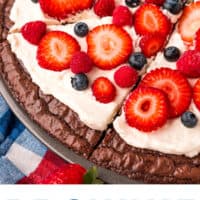 brownie fruit pizza cut into slices with recipe name at the bottom