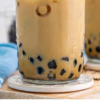 bubble tea in a mason jar with a boba straw with with recipe name at the bottom