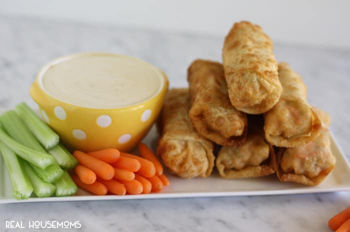 Enjoy all the classic flavors of your favorite buffalo chicken wings in these BUFFALO CHICKEN EGG ROLLS!