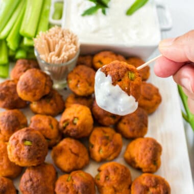Want buffalo wings WITHOUT the mess?! Buffalo Chicken Meatballs a poppable combination of spicy sauce, chicken, and celery with blue cheese for dipping!