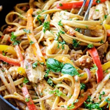 Creamy, CAJUN CHICKEN PASTA IN SUN-DRIED TOMATO ALFREDO SAUCE is melt in your mouth delicious and 1,000x better than any restaurant at a fraction of the cost and calories!