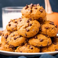 square image of cake mix pumpkin chocolate chips cookies piled on a plate