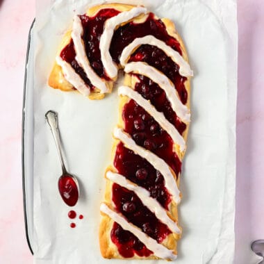 square image of a candy cane cherry danish on a baking sheet