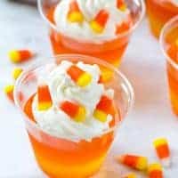 These CANDY CORN JELLO CUPS are an easy make-ahead treat that's perfect for Halloween parties or as a special fall snack!