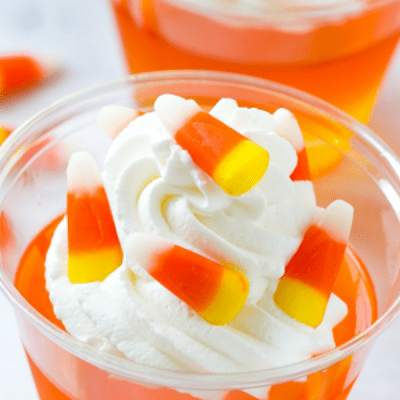These CANDY CORN JELLO CUPS are an easy make-ahead treat that's perfect for Halloween parties or as a special fall snack!