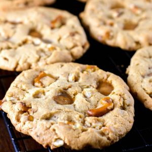 These Caramel Peanut Butter Pretzel Cookies are an over the top dessert that's a must for your holiday baking!