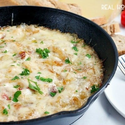 This CARAMELIZED ONION AND BACON SKILLET DIP is an ooey, gooey appetizer no one can resist!