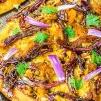 This Caramelized Onion and BBQ Pork Flatbread is a fun and easy weeknight dinner that the whole family will be ranting and raving about!