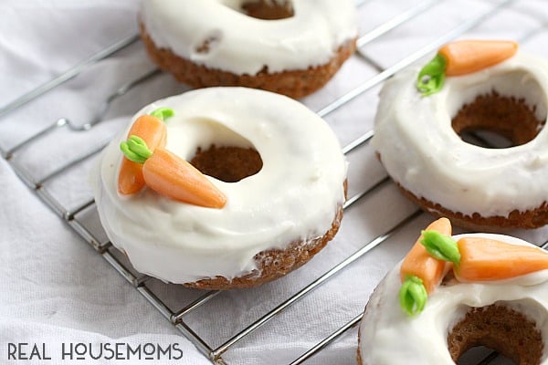 These fluffy BAKED CARROT CAKE DONUTS are glazed with a simple cream cheese frosting for a new twist on a classic Easter dessert!